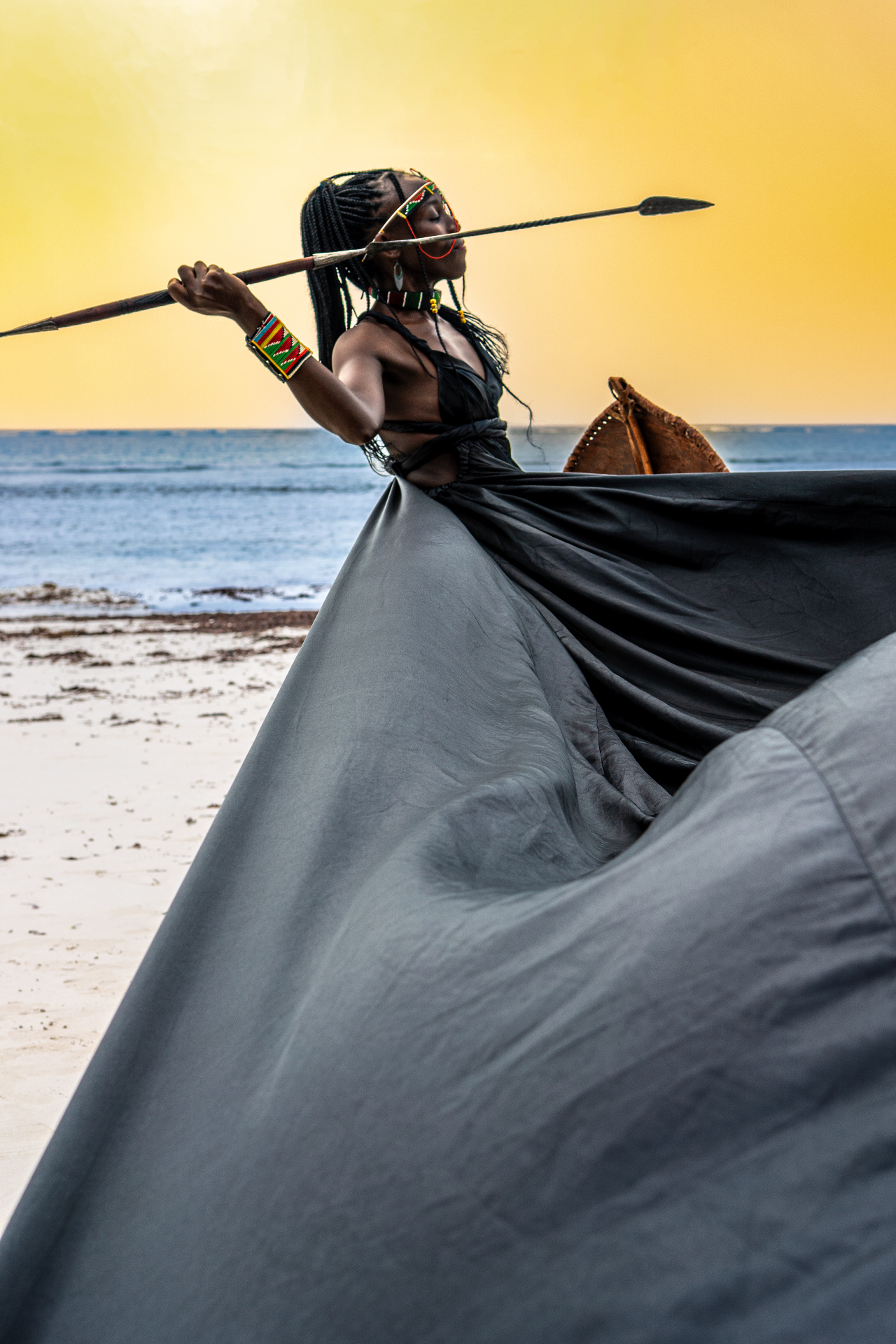 Black flying dress on Diani Beach at sunset